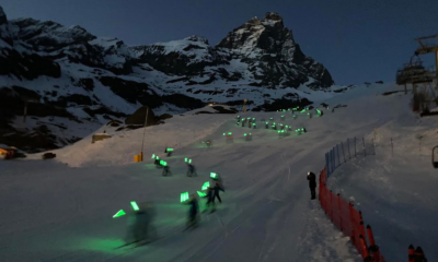 Cervinia si accende di verde: 450 fiaccole sulla neve per la ricerca sul cancro